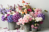 HYDRANGEAS, DAHLIAS, ZINNIA ELEGANS AND ASTERS IN ZINC BUCKETS