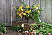 RANUNCULUS IN BOUQUET WITH NARCISSUS AND SYRINGA