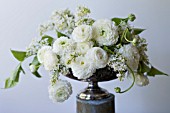 WHITE RANUNCULUS ASIATICUS AND SYRINGA VULGARIS ANGEL IN ANTIQUE SILVER PEDESTAL BOWL