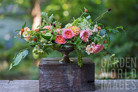 ONE_SIDE_OF_TWOSIDED_FLORAL_ARRANGEMENT_USING_DAHLIAS_ROSES_AND_SUMMER_FLOWERS_INCLUDING_ROSA_ROMANT