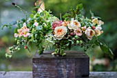 ONE SIDE OF TWO-SIDED FLORAL ARRANGEMENT USING DAHLIAS, ROSES AND SUMMER FLOWERS INCLUDING ROSA CARAMEL ANTIKE