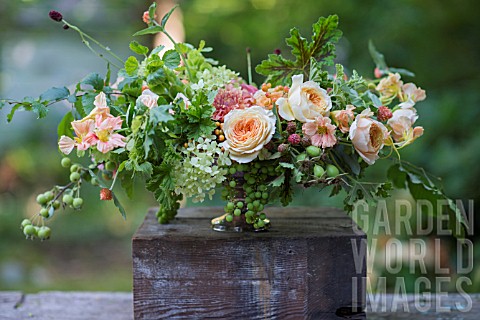 ONE_SIDE_OF_TWOSIDED_FLORAL_ARRANGEMENT_USING_DAHLIAS_ROSES_AND_SUMMER_FLOWERS_INCLUDING_ROSA_CARAME