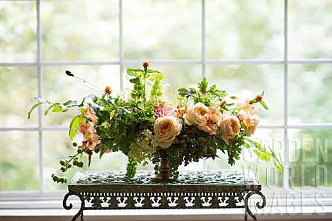 ONE_SIDE_OF_TWOSIDED_FLORAL_ARRANGEMENT_USING_DAHLIAS_ROSES_AND_SUMMER_FLOWERS_INCLUDING_ROSA_CARAME
