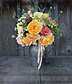 ROSA GRAHAM THOMAS AND ROSA PORT SUNLIGHT IN BOUQUET OF DAVID AUSTIN ENGLISH ROSES WITH HERBS AND SEED HEADS