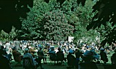 HISTORICAL RHS CHELSEA, VISITORS LISTENING TO THE BAND OF H.M. GRENADIER GUARDS IN 1960.