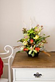 FRESH FLOWER ARRANGEMENT IN BEDROOM