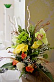 FRESH FLOWER ARRANGEMENT IN BEDROOM