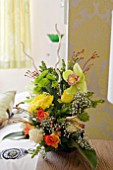 FRESH FLOWER ARRANGEMENT IN BEDROOM