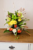 FRESH FLOWER ARRANGEMENT IN BEDROOM