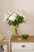 FRESH FLOWER ARRANGEMENT IN BEDROOM