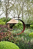 RHS CHELSEA FLOWER SHOW 2013, M&G CENTENARY GARDEN WINDOWS THROUGH TIME DESIGNER ROGER PLATTS.