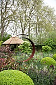 RHS CHELSEA FLOWER SHOW 2013, M&G CENTENARY GARDEN WINDOWS THROUGH TIME DESIGNER ROGER PLATTS.