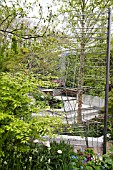 RHS CHELSEA FLOWER SHOW 2013,   THE WASTELAND GARDEN, DESIGNER KATE GOULD.  GOLD MEDAL WINNER  RECYCLED SHOPPING TROLLEY SCREEN/SUPPORT