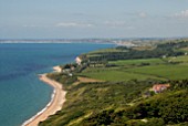 VIEW OF GARDEN AT CLIFF HOUSE, DORSET WITH WEYMOUTH BAY BEYOND