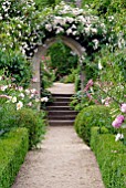 GOTHIC ARCH WITH RAMBLING ROSE AT HANHAM COURT