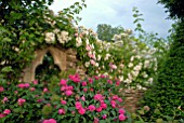 GOTHIC WINDOW WITH ROSES AT HANHAM COURT