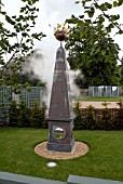 OBELISK AT THE GARDEN OF SURPRISES, BURGHLEY HOUSE, STAMFORD, DESIGNER GEORGE CARTER.