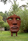 VERTICAL FACE BY RICK KIRBY IN THE SCULPTURE GARDEN AT BURGHLEY HOUSE, STAMFORD.
