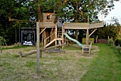 TREE HOUSE AND PLAY AREA IN COUNTRY GARDEN