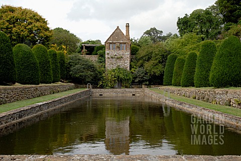 FISHPOND__YEW_HEDGES_AND_TOWER_HOUSE_AT_MAPPERTON_IN_DORSET