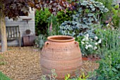 LARGE TERRACOTTA POT IN RUSTIC COUNTRY GARDEN