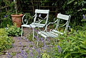 TWO GARDEN CHAIRS ON TERRACE