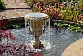 URN WATER FEATURE IN POOL IN SHOW GARDEN AT MALVERN SPRING SHOW 2009, DESIGN BY JAMES STEED