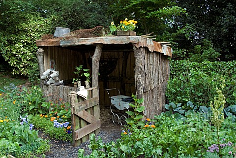 A_CHILDS_GARDEN_IN_WALES_BY_YSGOL_BRYN_CASTELL