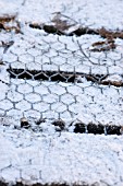 CHICKEN WIRE OVER WOOD TO STOP SLIPPING   SNOW