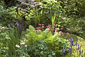 HERON STATUE IN BOG GARDEN