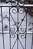 GARDEN GATE AFTER A FALL OF SNOW