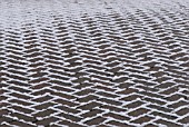 SNOW PATTERNS ON BRICK PAVING