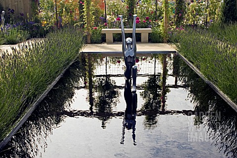 VIEW_OF_SCULPTURE_AND_POND__DINING_OUT_BY_SUE_ADCOCK__NEC_GARDENERS_WORLD_LIVE__2006