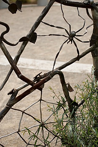 METAL_SCULPTURE_WITH_SPIDER_AND_SPIDERS_WEB__ENTRANCE_TO_CHILDRENS_GARDEN__TORONTO_ISLANDS_GARDENS__