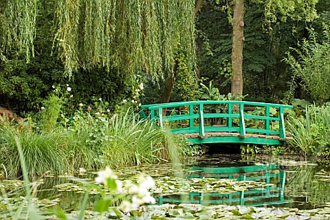 JAPANESE_BRIDGE_IN_MONETS_GARDEN__GIVERNY__FRANCE__AUGUST