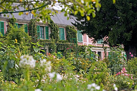 CLAUDE_MONETS_HOUSE_SEEN_FROM_THE_GARDEN_AT_GIVERNY__FRANCE__AUGUST
