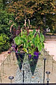 TABLE WITH PLANTERS AT THE 15TH FESTIVAL OF GARDENS,  AT CHAUMONT SUR LOIRE,  FRANCE,  AUGUST