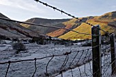 WINTER VIEW IN WALES,  FROSTY SHADE AND SUNNY HILLSIDE