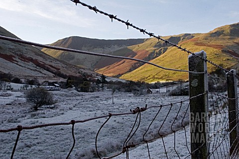 WINTER_VIEW_IN_WALES__FROSTY_SHADE_AND_SUNNY_HILLSIDE