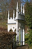 VIEW OF FOLLY WITH GALANTHUS,  SNOWDROPS AT PAINSWICK ROCOCCO GARDEN