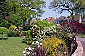 SUBURBAN FRONT GARDEN ON CORNER PLOT