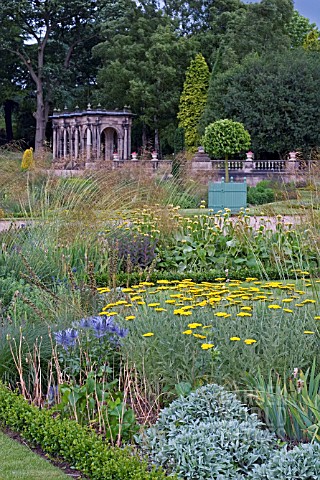 VIEW_OF_TRENTHAM_ITALIANATE_GARDENS__PLANTING_BY_TOM_STUART_SMITH__WITH_CHARLES_BARRY_LOGGIA_IN_THE_