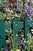 GARDEN,  FLOWERS AND PICKET FENCE