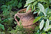 URN IN UNDERGROWTH