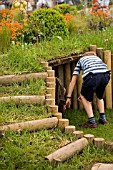 SUSIES GARDEN- CHILD PLAYING(DESIGNER: SUE JOLLANS) IN AID OF THE MENINGITIS TRUST, MALVERN SPRING GARDENING SHOW 2008