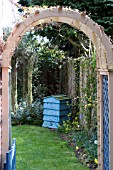 VIEW THROUGH GARDEN GATE AND ARCH