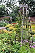 WOODEN TRELLIS OBELISKS IN WALLED GARDEN AT MIDDLETON HALL