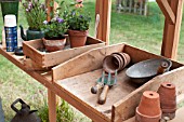 POTTING BENCH IN GREENHOUSE