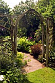 RUSTIC WOODEN ARCH AND TRELLIS WORK AT WHIT LENGE GARDEN,  HARTLEBURY