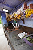 POTTING SHED TABLE WITH DRIED FLOWERS